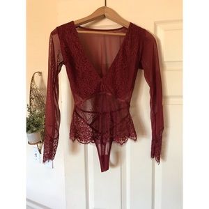 Backless plunging long sleeve bodysuit